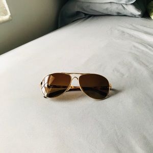 Oakley beautiful gold frame & brown lenses